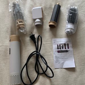 4 n 1 hair-styler. Brand new, never used.